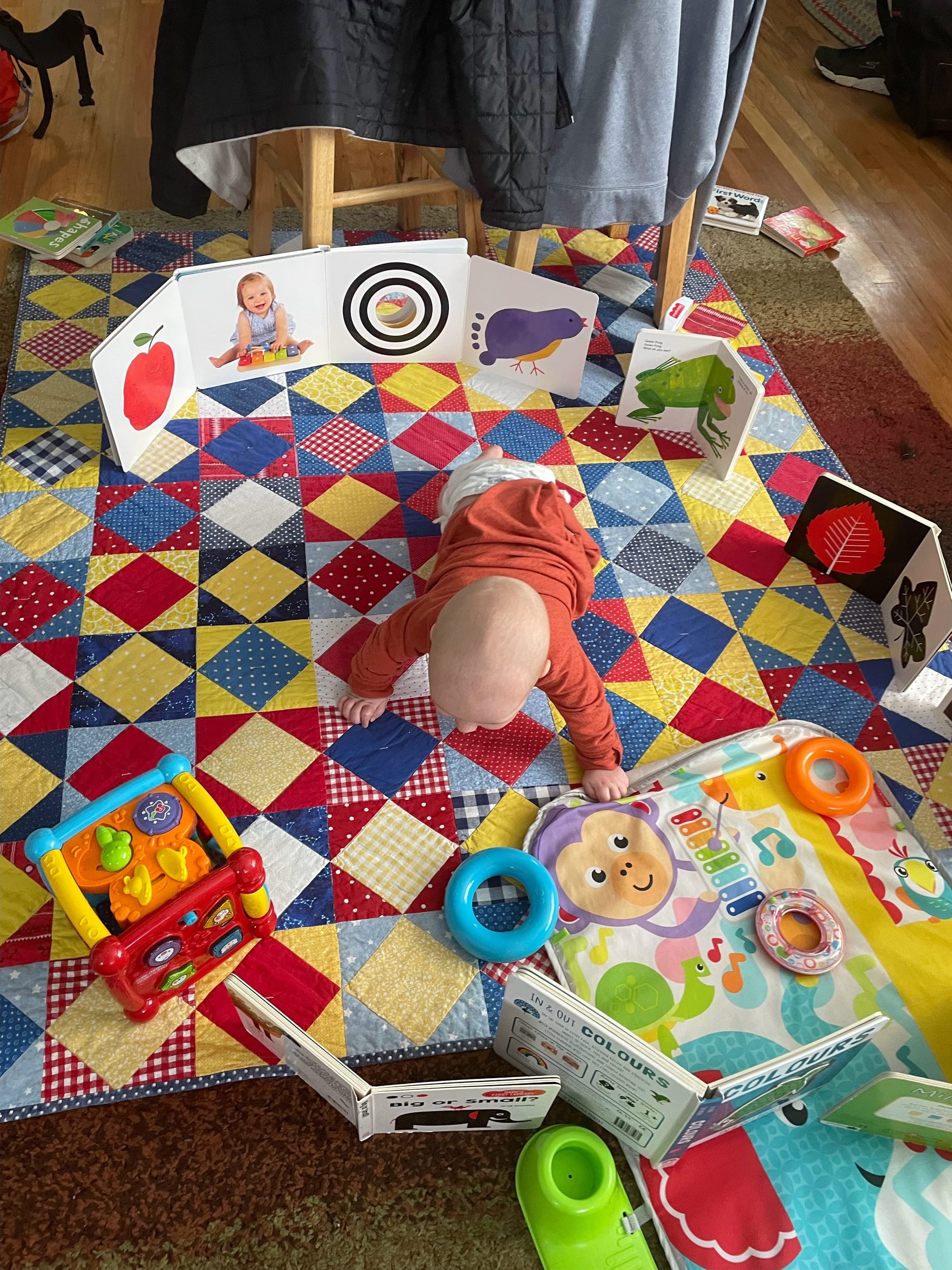 Baby around five and a half months pushing up on straight arms during tummy time
